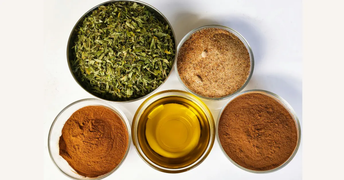 Traditional ubtan ingredients including turmeric powder, gram flour , rose water, and sandalwood